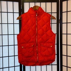 Red puff vest